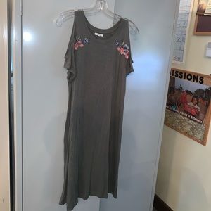 Green dress with floral designs